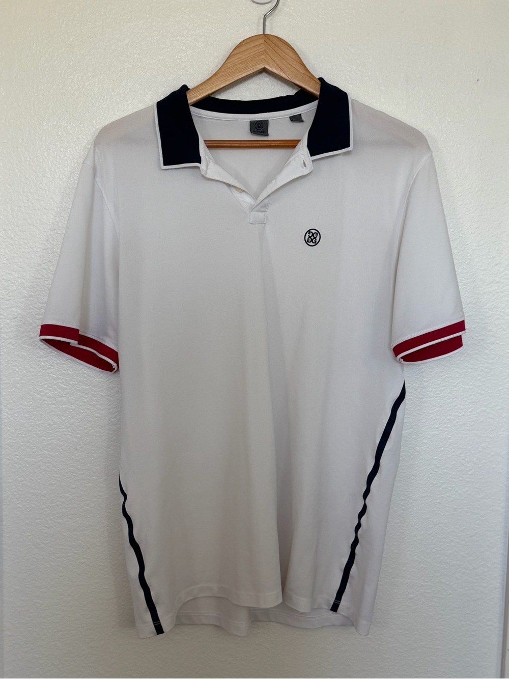 G/FORE White Polo with Navy Collar and Red Sleeve Stripes